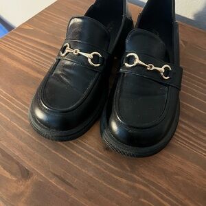 Liang Li Zi Black Loafers with Gold Detail